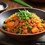 한식 테이크아웃 추천 메뉴 - A vibrant Korean kimchi fried rice dish served in a rustic ceramic bowl, featuring bright orange-red...